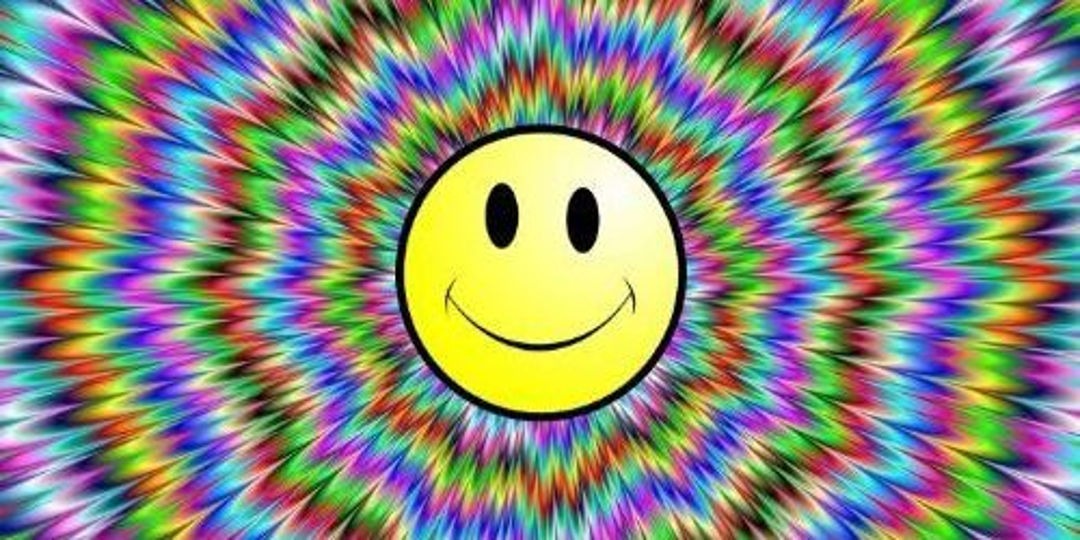 Widescreen Smile with psychedelic background