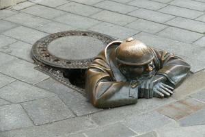 guy in the bottom of a sewer